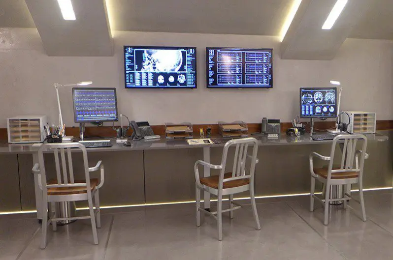 The Observation Room in Kingsman: The Golden Circle with Emeco Navy Chairs