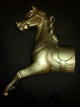 Wall mountable fairground horse in gold by UK Gallopers