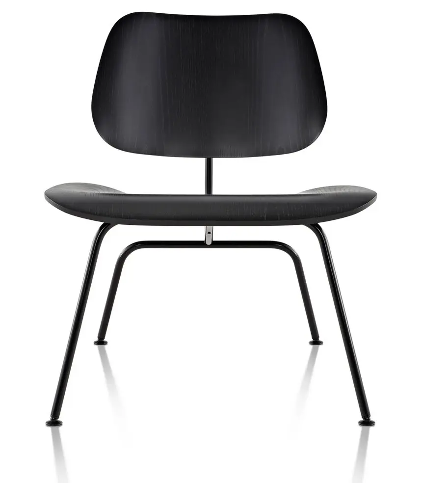 In Dunnes office we see an Eames Molded Plywood Lounge Chair with metal base The Eames Molded Plywood Lounge Chairs are perfect for living rooms and office spaces, a classic design that Time magazine named the Best Design of the 20th Century. It described these chairs as “something elegant, light, and comfortable. Much copied, but never bettered.” A true original, available with or without upholstery and a choice of metal finishes.