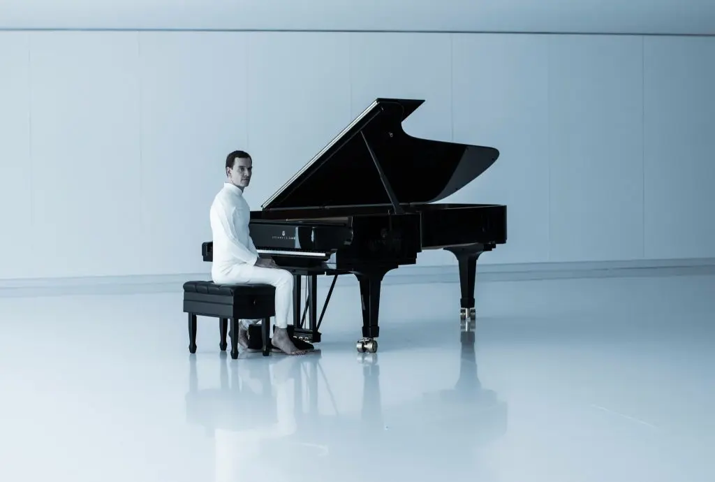 David seated at the Steinway piano in Alien Covenant
