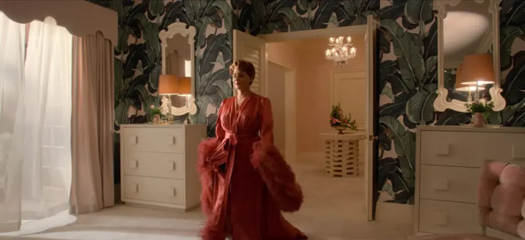 The Beverly Hills Hotel bedroom where Jack is taken by Avis Amberg features the Martinique banana palm wallpaper