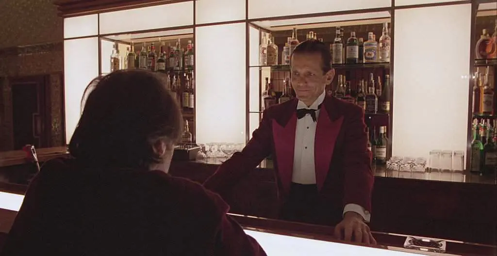 Jack takes a seat at the Gold Room bar in The Shining