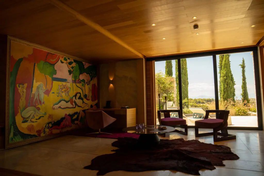 miles brons house full of art and furniture in glass onion