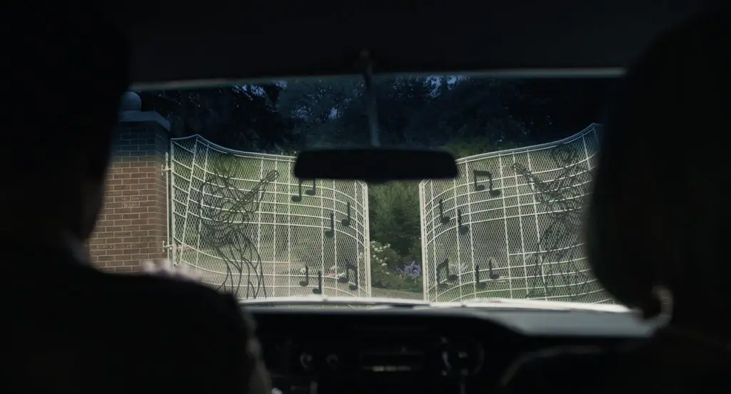 The gates of Graceland in Priscilla