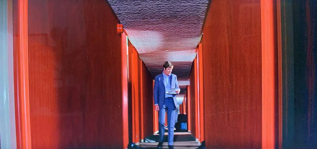 charlie crocker in lancaster hotel corridor