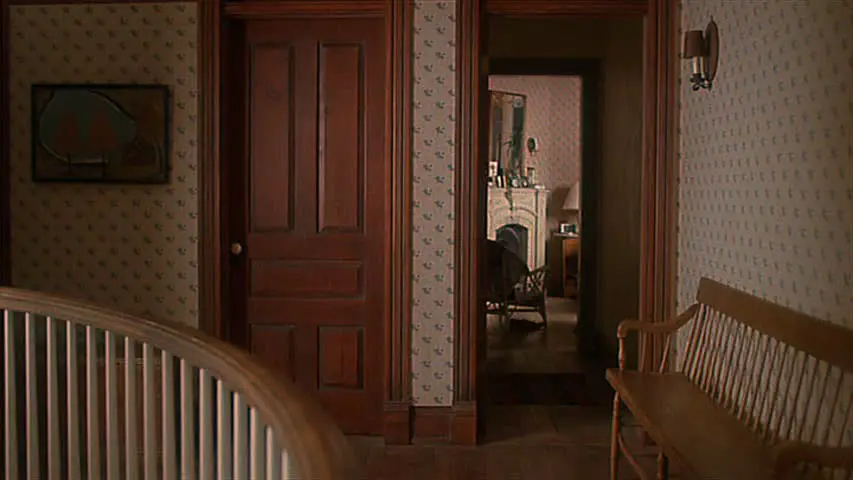 The Deetz house with Maitland floral wallpaper in Beetlejuice (1988)