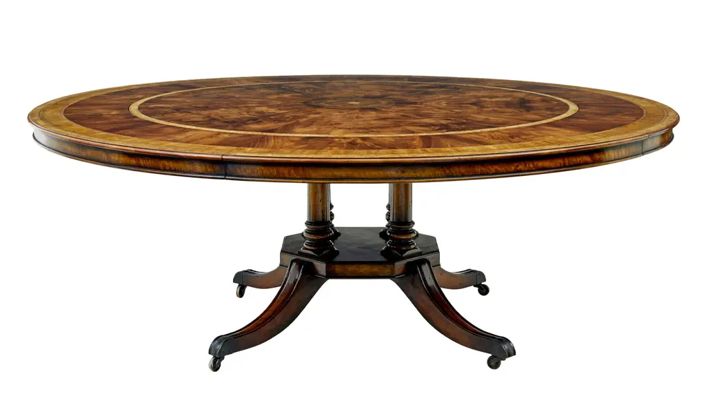 circular-extending-jupe-dining-table-with-burr-detailing-comp vinterior