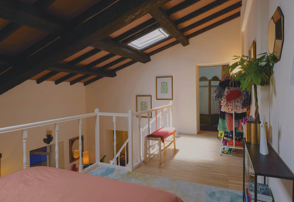 Emily's apartment, showing the loft layout of her top-floor chambre de bonne (maid's quarters) set.