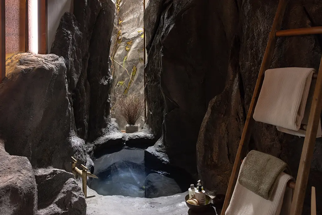 The bath, sculptured out of rock in Verity