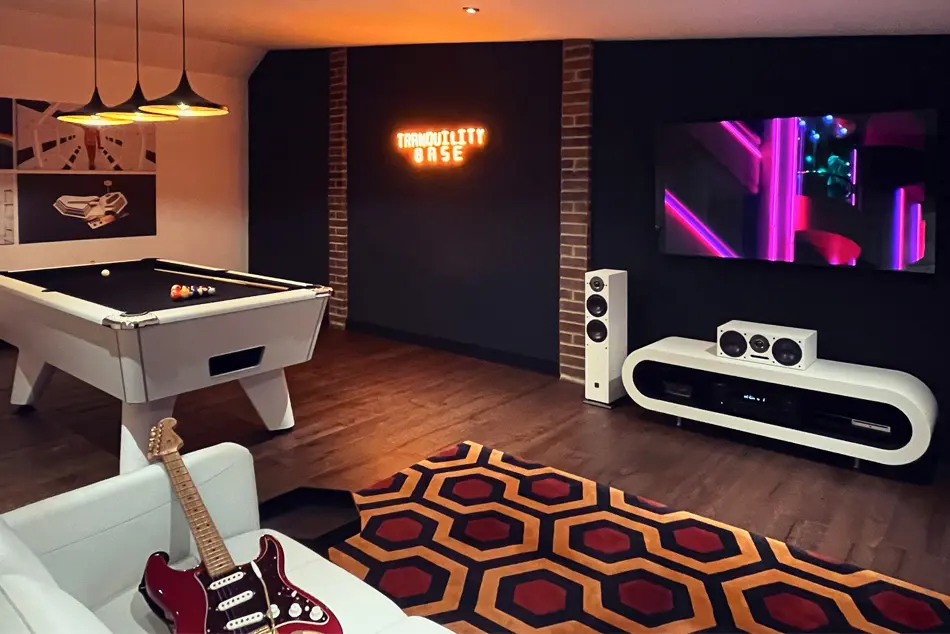Hicks Hexagon hand-tufted 1 ply wool rug in a games room in the UK