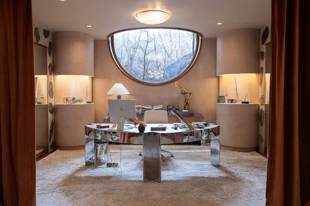 Verity's office with chrome desk