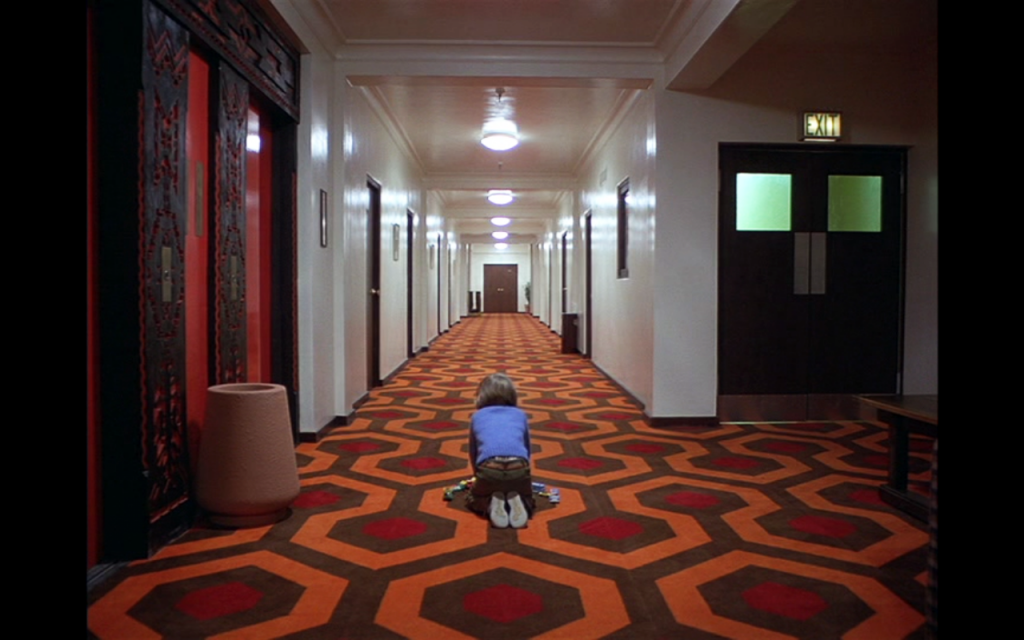 Danny-corridor-hexagonal-carpet-the-shining-kubrick