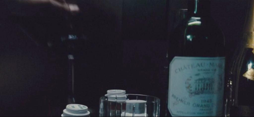 On Bruce Wayne's bedside table we also see a Baccarat whisky glass