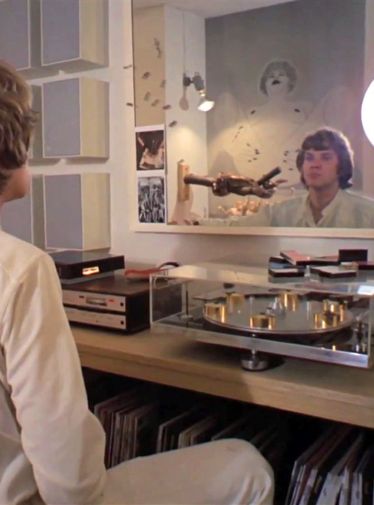 Alex in his bedroom in A Clockwork Orange