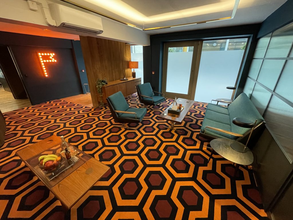 The newly designed office of Creative Outpost features the Hicks Hexagon carpet as seen in The Shining from Film and Furniture