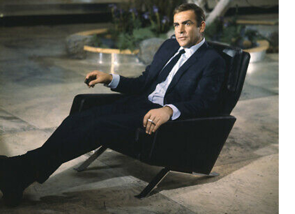 Sean Connery as Bond seated in a Leo Chair, designed by Robin Day