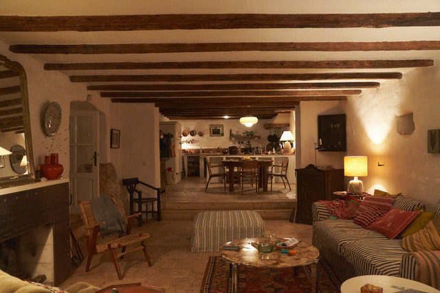 The living room, looking through to the dining area and kitchen of the Croatian villa in Conversations With Friends. 