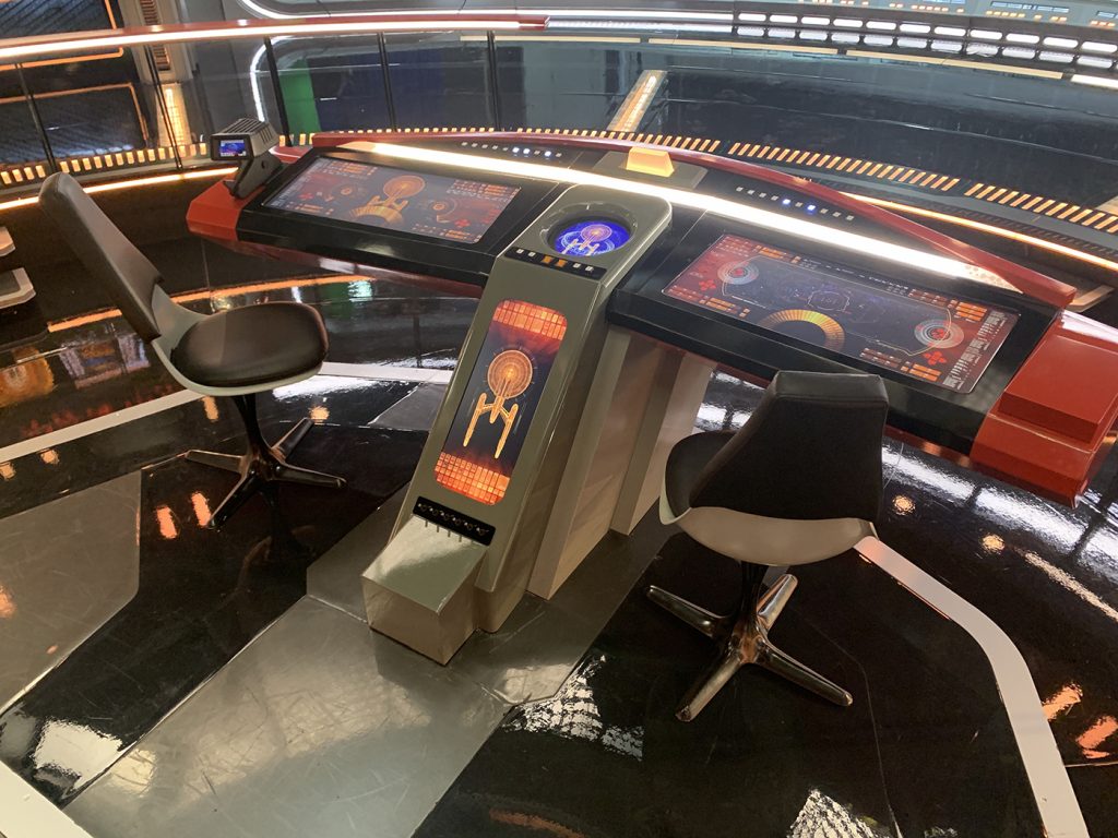 Strange New Worlds Enterprise design Helm and Navigator stations in the Bridge Tulip chairs