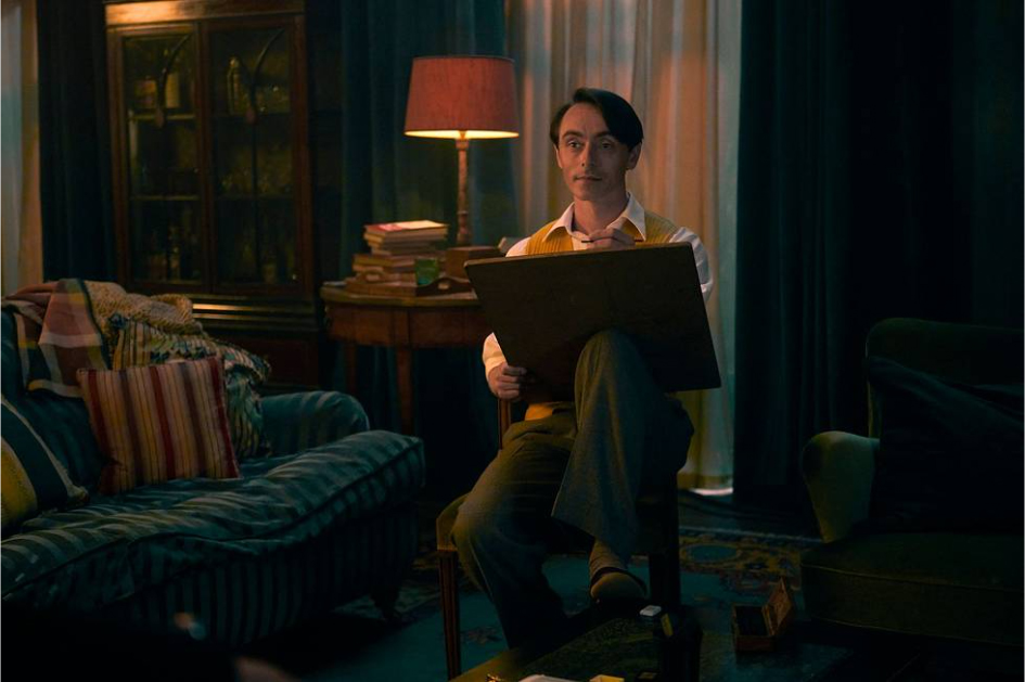 David Dawson as Patrick in his apartment, drawing Tom. 
