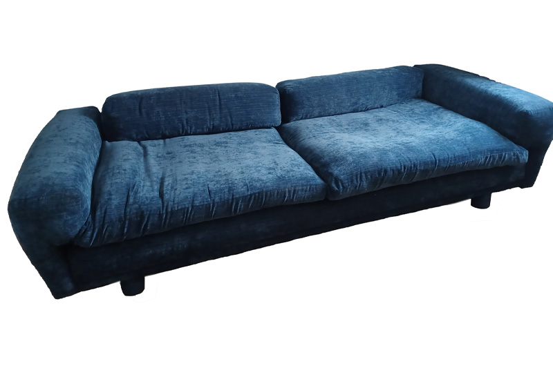 An original vintage Howard Keith Diplomat sofa refurbished and reupholstered in blue fabric for sale on behalf of a private client.
